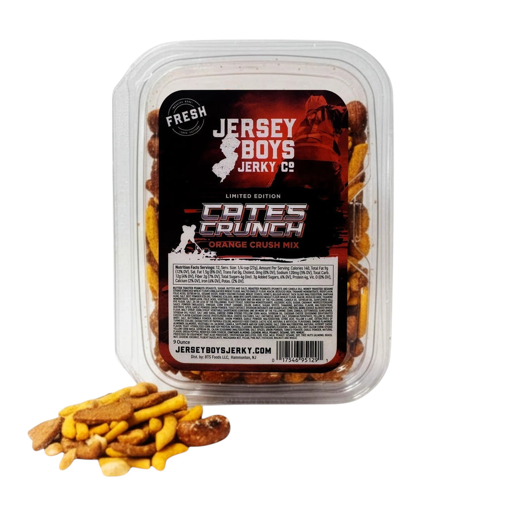 Jersey Boys Jerky Cates Crunch Orange Crush snack mix in a clear plastic container with a pile of nuts and pretzels.