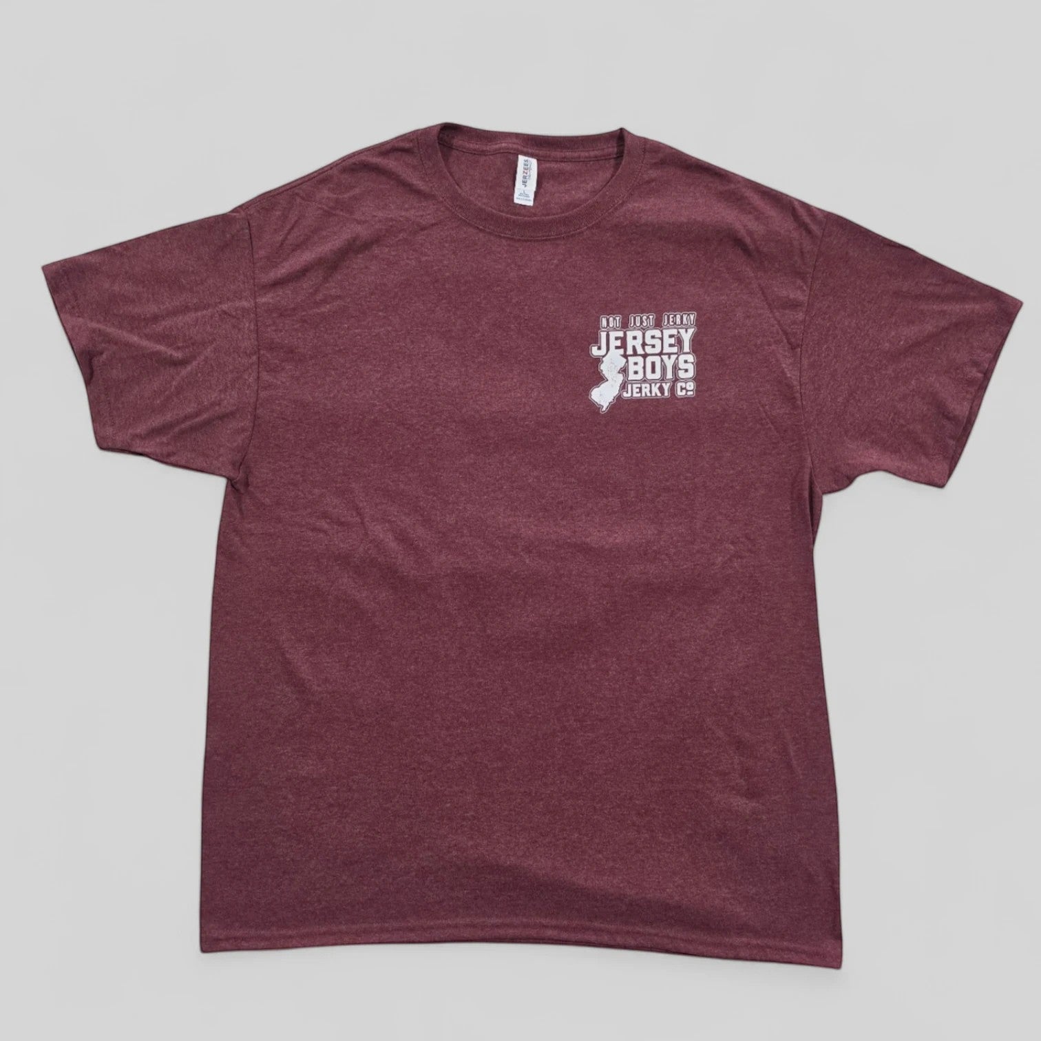Jersey Boys Jerky maroon performance t-shirt with white chest logo, moisture-managing fabric for active wear.
