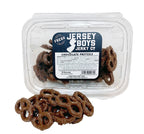 Jersey Boys Jerky milk chocolate covered pretzels in a clear plastic container with a nutritional label