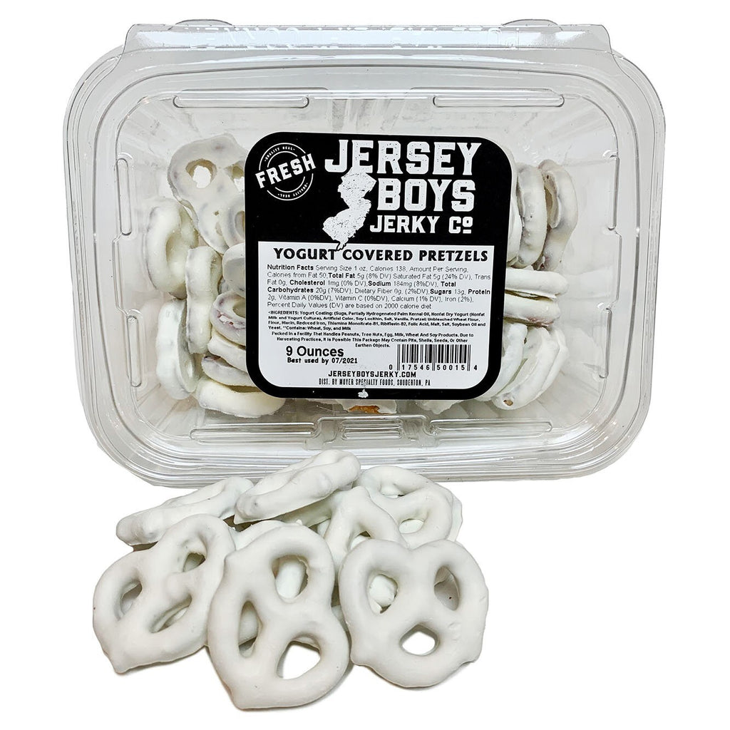 Jersey Boys Jerky yogurt covered salted pretzels in a clear plastic container with a pile of pretzels in front